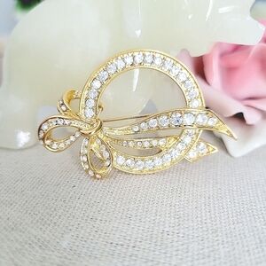 VINTAGE Nolan Miller crystal bow brooch